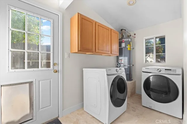 a view of entryway with washer and dryer