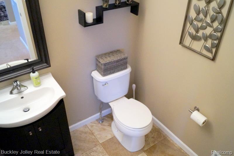 625 Hewitt Street Howell, MI 48843 - Photo 8 of 17 Laminate Flooring in Half Bath