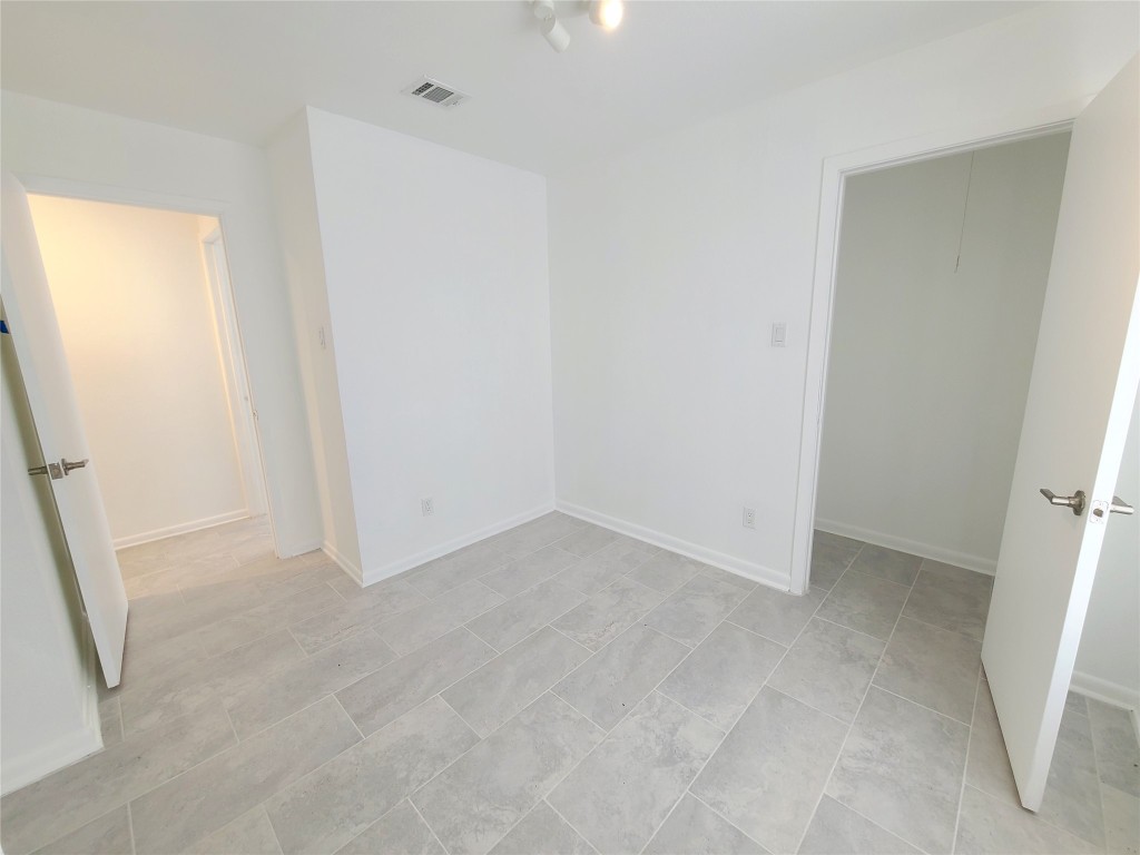 6216 Hogan Avenue Austin, TX 78741 - Photo 18 of 25 3rd Bedroom with walk in closet