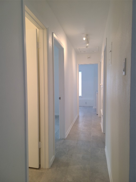 6216 Hogan Avenue Austin, TX 78741 - Photo 10 of 25 Hallway looking into bedrooms and Laundry room