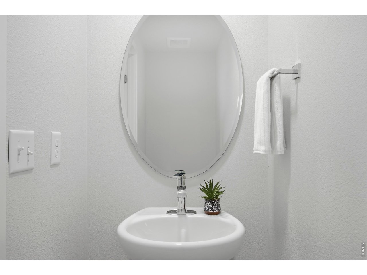 5230 Rendezvous Parkway Timnath, CO 80547 - Photo 14 of 31 Main Floor Powder Bathroom