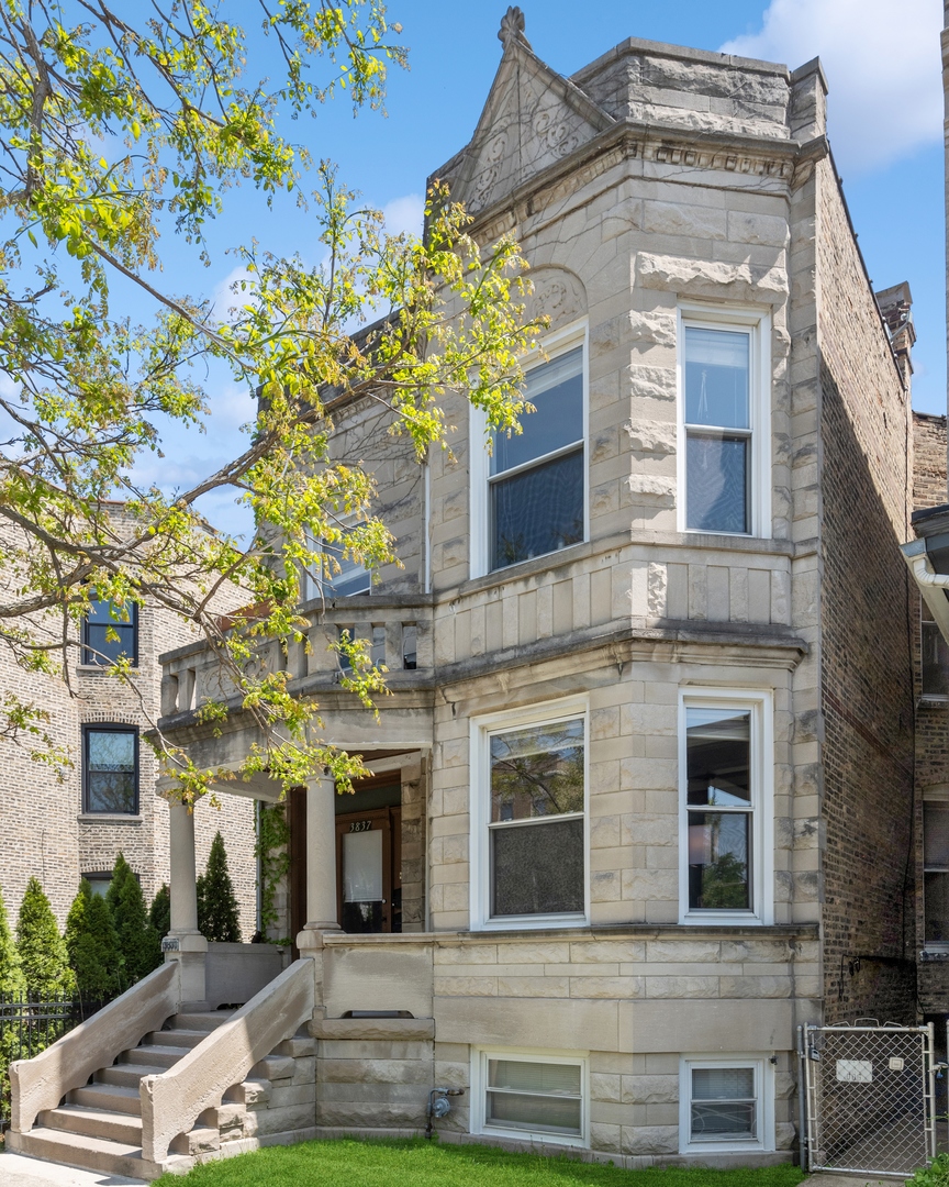 3837 North Lakewood Avenue Chicago, IL 60613 - Photo 1 of 19 a front view of a multi story residential apartment building