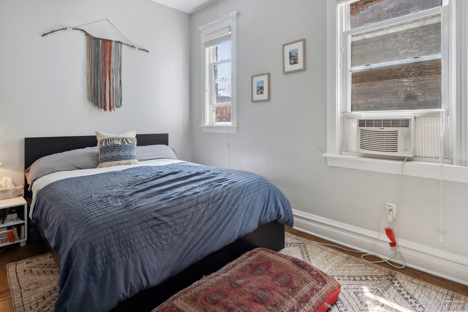 3837 North Lakewood Avenue Chicago, IL 60613 - Photo 7 of 19 a bedroom with a bed and wooden floor