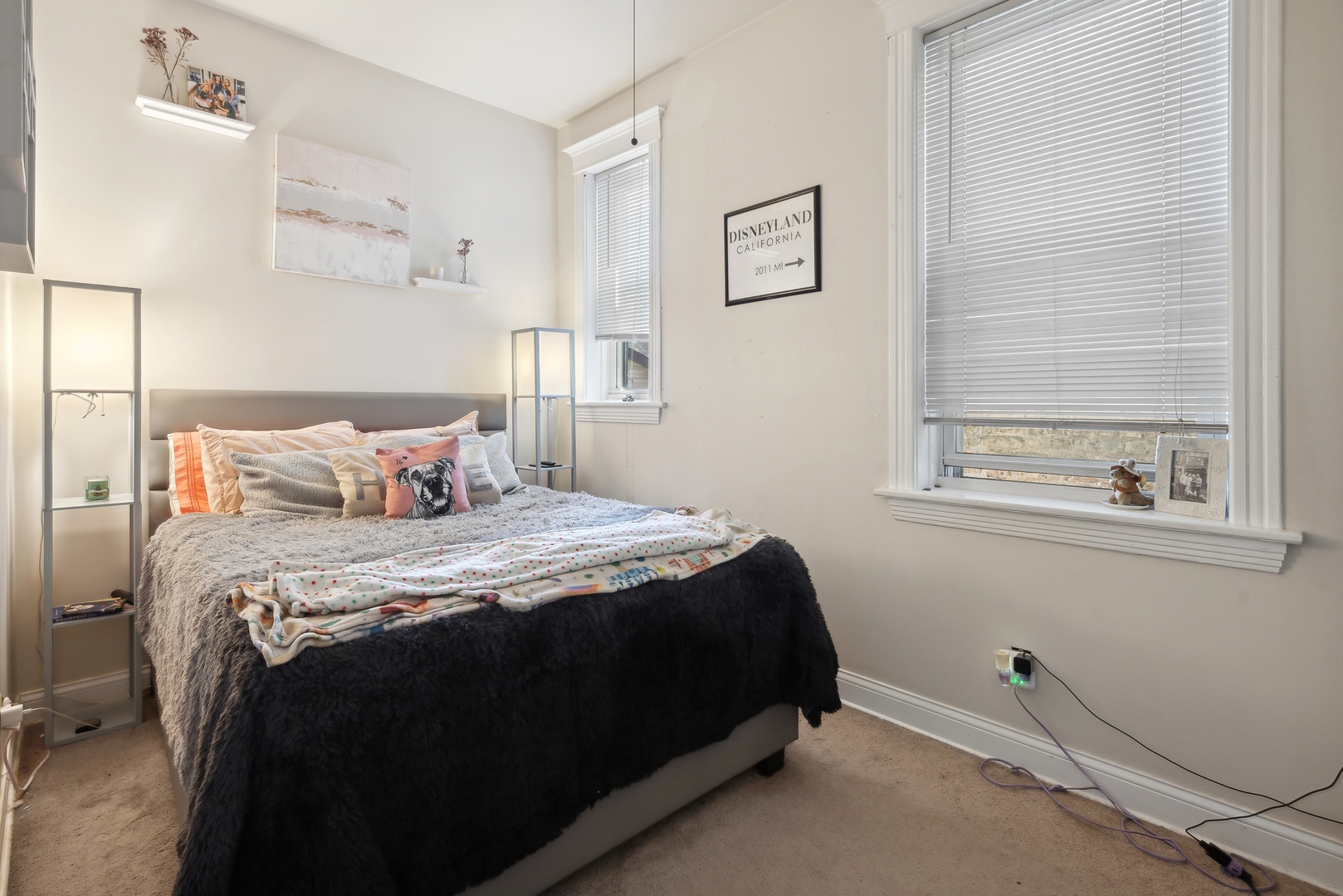 3837 North Lakewood Avenue Chicago, IL 60613 - Photo 8 of 19 a bedroom with a bed and a window