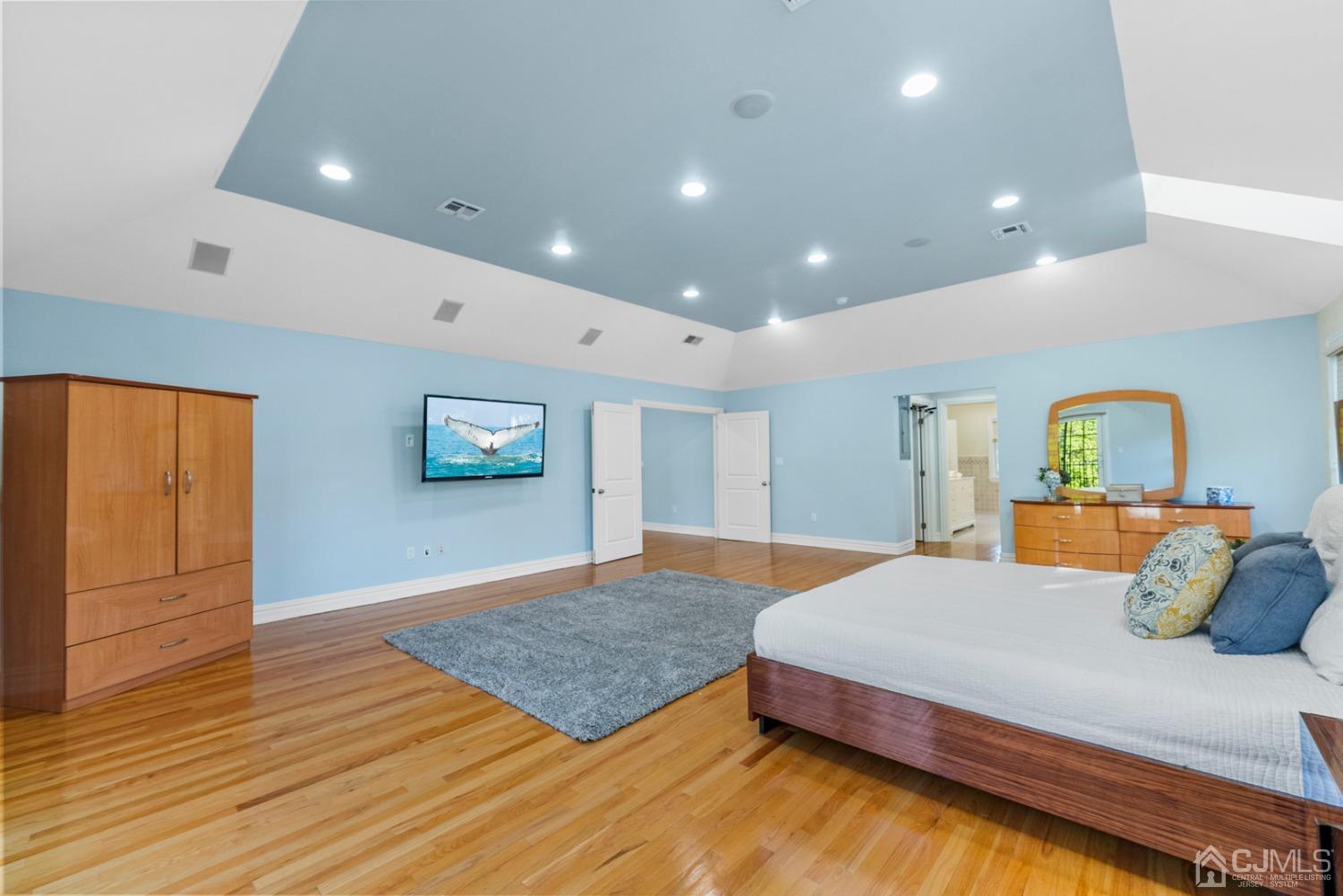 34 Richard Road Edison, NJ 08820 - Photo 36 of 76 a bedroom with a bed and wooden floor