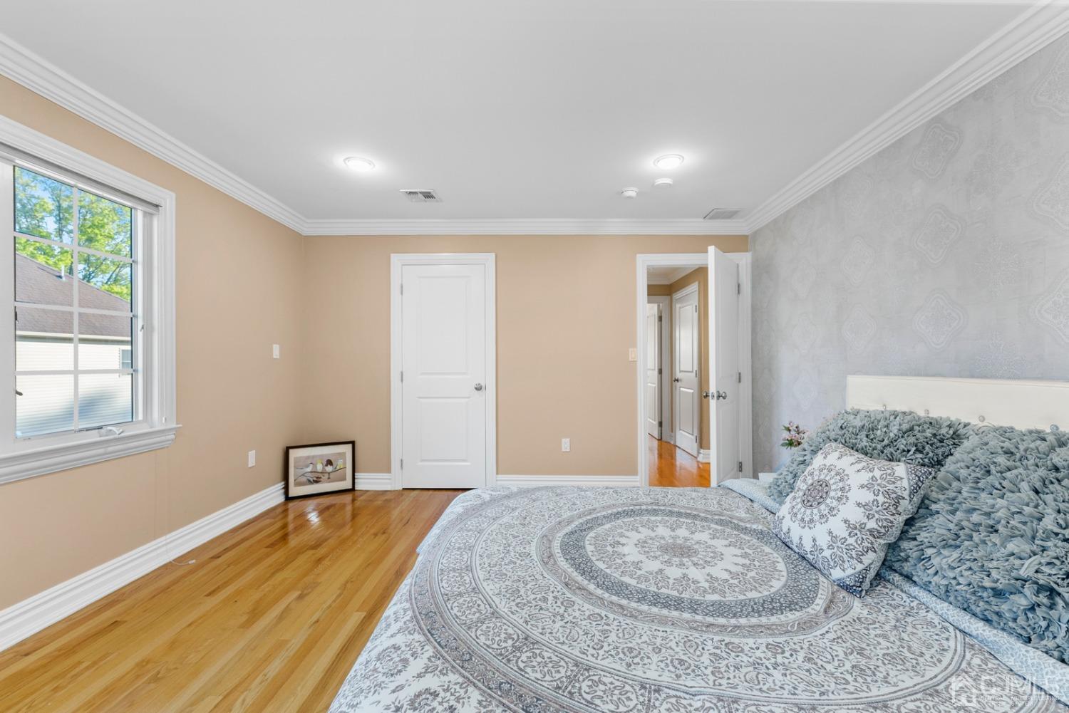 34 Richard Road Edison, NJ 08820 - Photo 53 of 76 a bedroom with a bed and a large window
