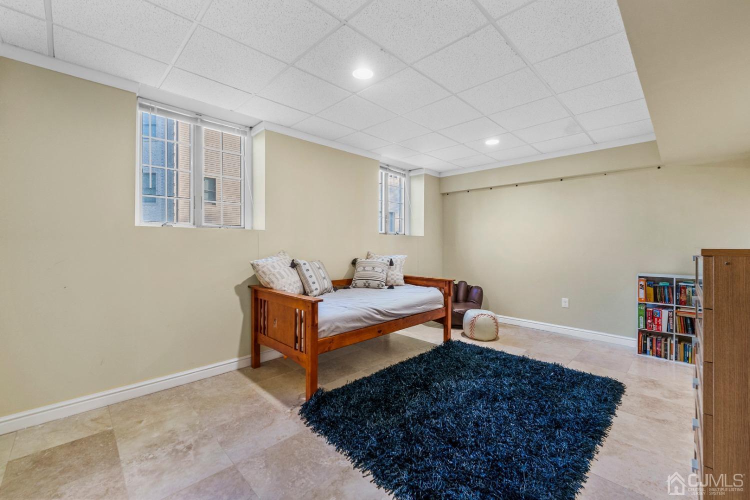 34 Richard Road Edison, NJ 08820 - Photo 54 of 76 a living room with furniture and a rug