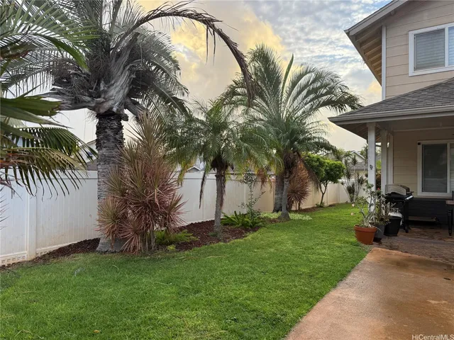 a view of a backyard with a garden