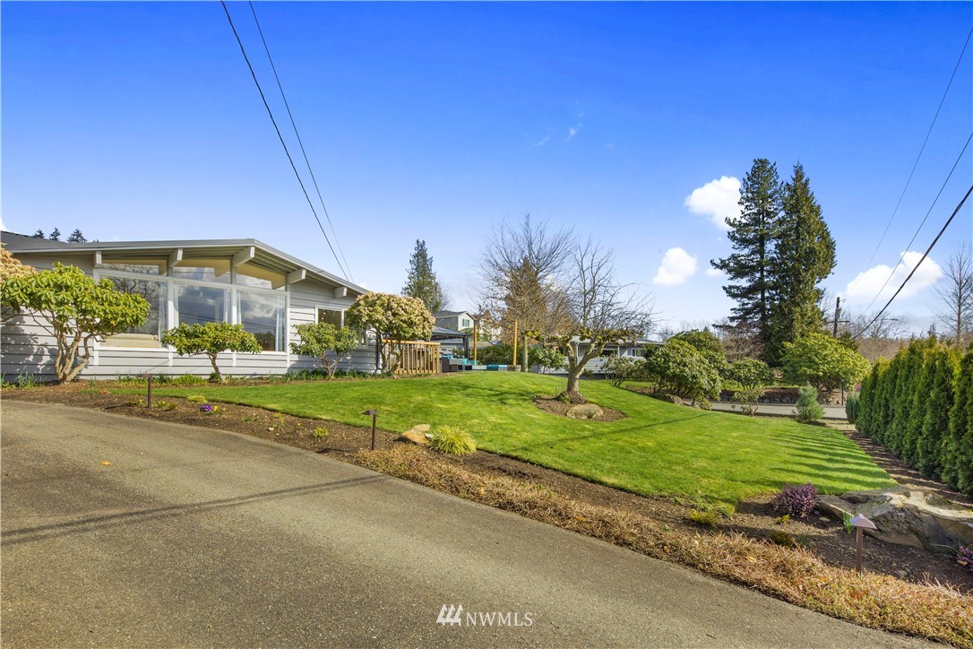 33 243rd Place Southeast Bothell, WA 98021 - Photo 2 of 28 a view of a house with a big yard
