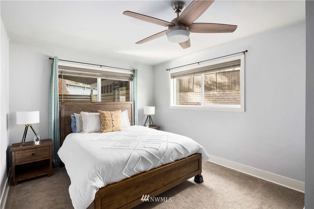 33 243rd Place Southeast Bothell, WA 98021 - Photo 12 of 28 a bedroom with a bed and a window