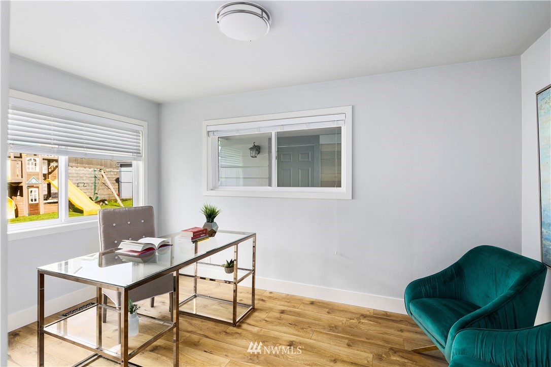 33 243rd Place Southeast Bothell, WA 98021 - Photo 15 of 28 a living room with furniture and a window