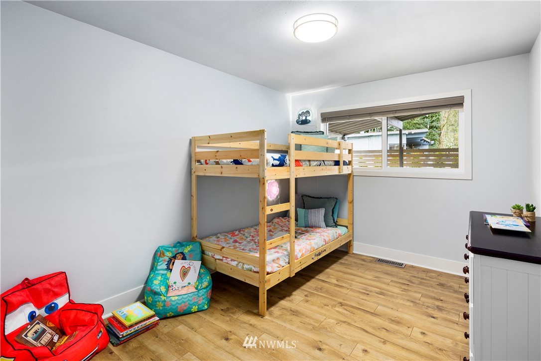 33 243rd Place Southeast Bothell, WA 98021 - Photo 16 of 28 a room with furniture and a wooden floor