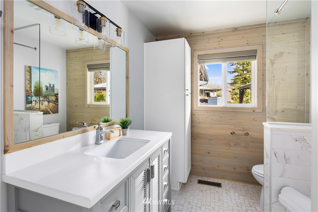 33 243rd Place Southeast Bothell, WA 98021 - Photo 17 of 28 a bathroom with a sink toilet and shower