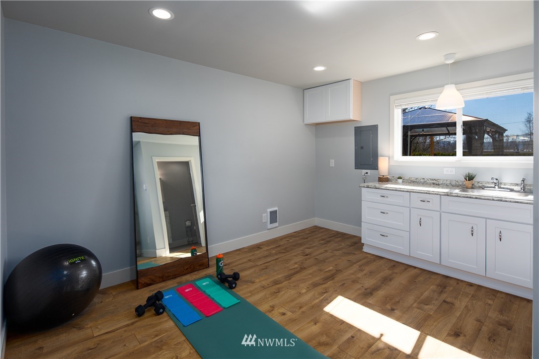 33 243rd Place Southeast Bothell, WA 98021 - Photo 23 of 28 a kitchen with a sink and cabinets