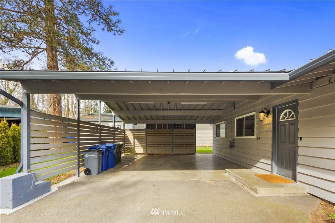 33 243rd Place Southeast Bothell, WA 98021 - Photo 27 of 28 a view of a balcony with a door and fire pit