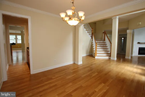 a view of a livingroom with wooden floor