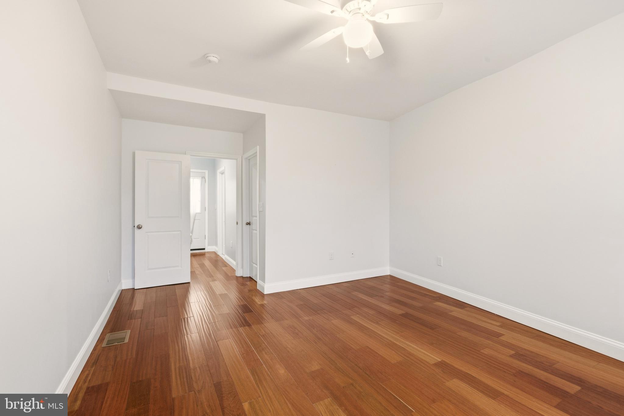 909 North 4th Street Philadelphia, PA 19123 - Photo 15 of 24 a view of a big room with wooden floor and windows