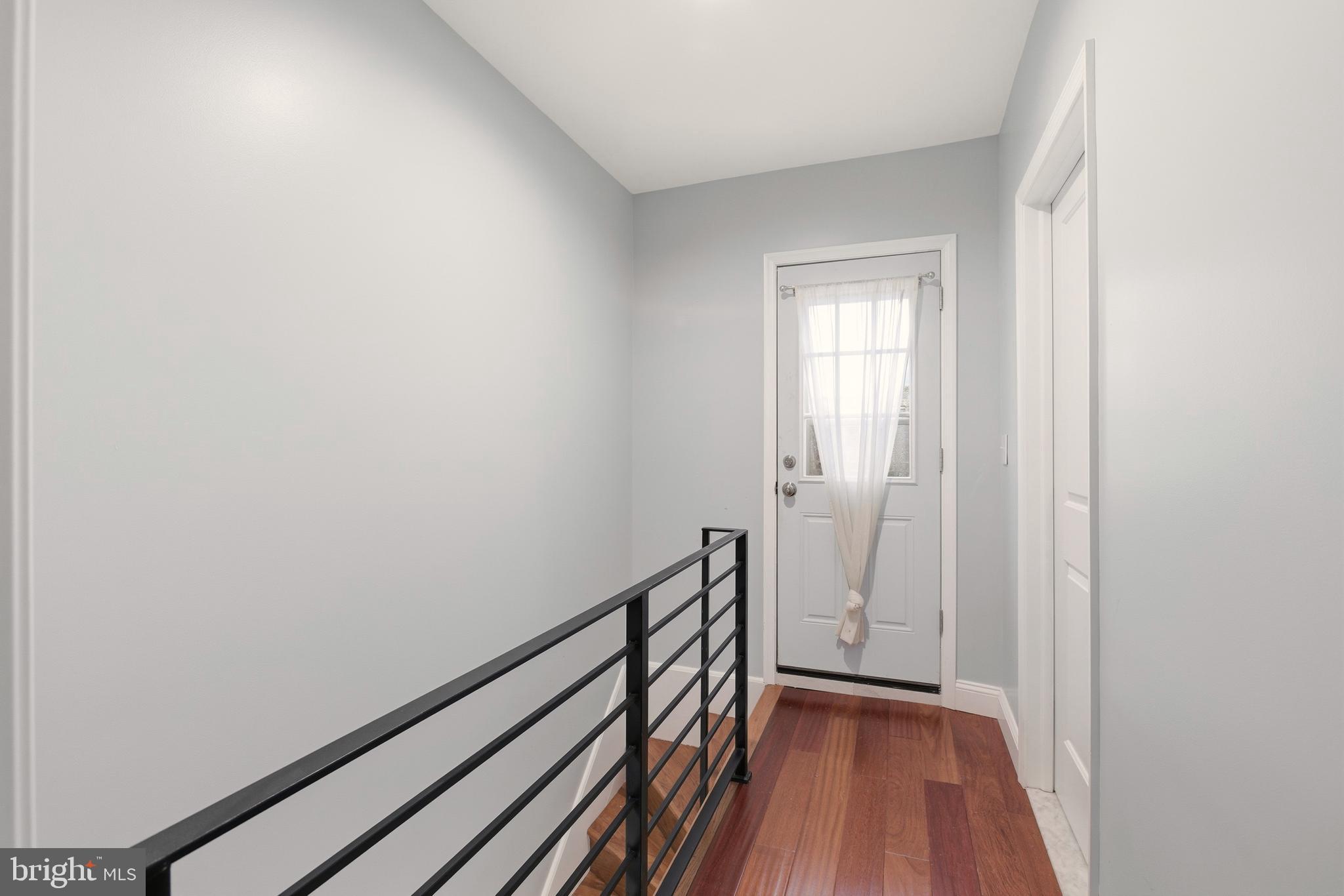 909 North 4th Street Philadelphia, PA 19123 - Photo 17 of 24 a view of a hallway with wooden floor