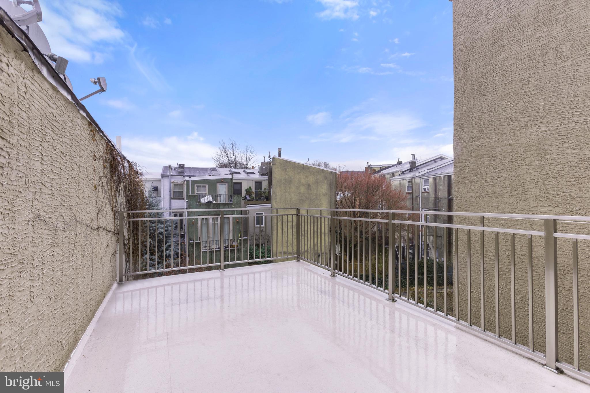 909 North 4th Street Philadelphia, PA 19123 - Photo 21 of 24 a view of balcony with a small yard