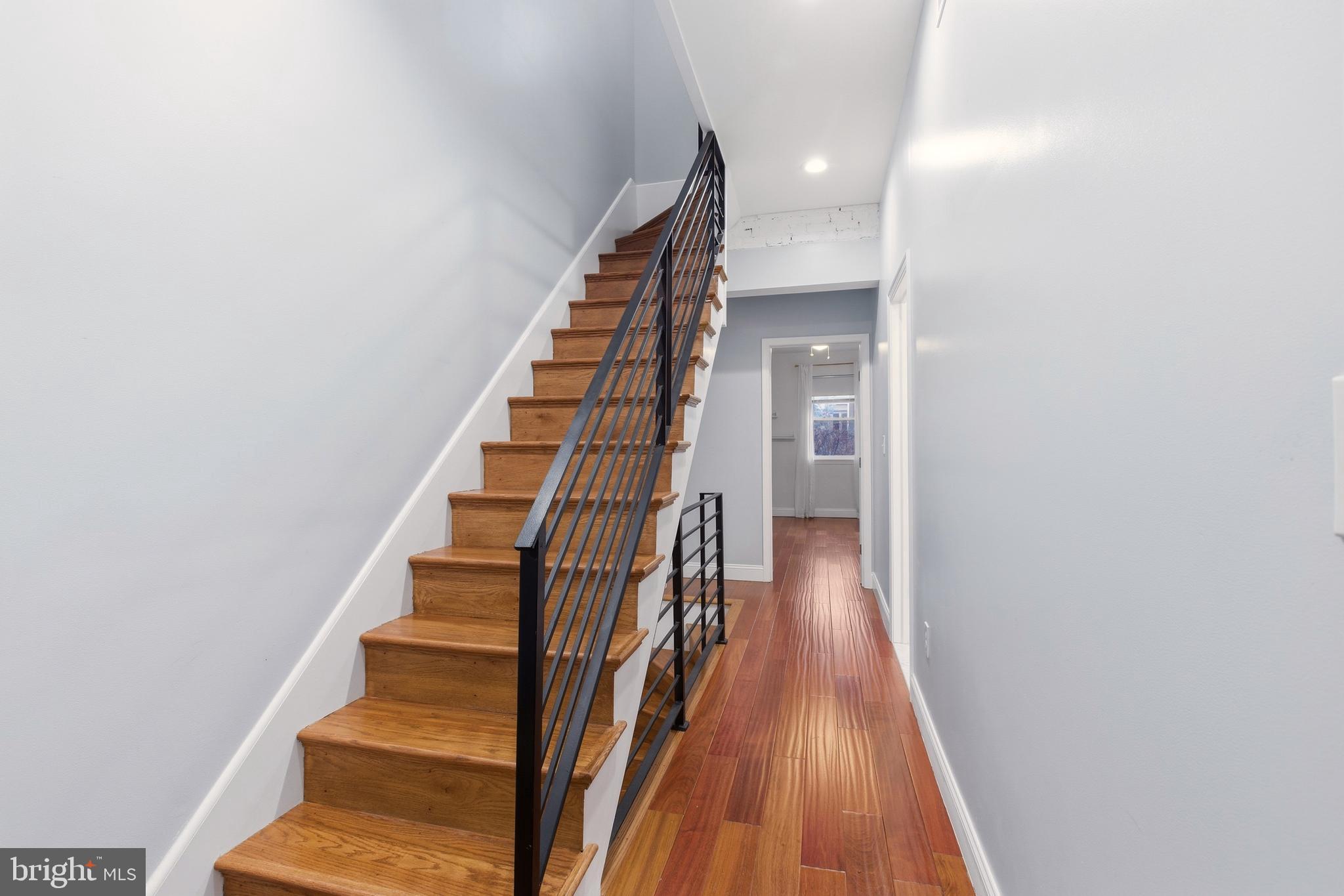 909 North 4th Street Philadelphia, PA 19123 - Photo 10 of 24 a view of a hallway with wooden floor and entryway