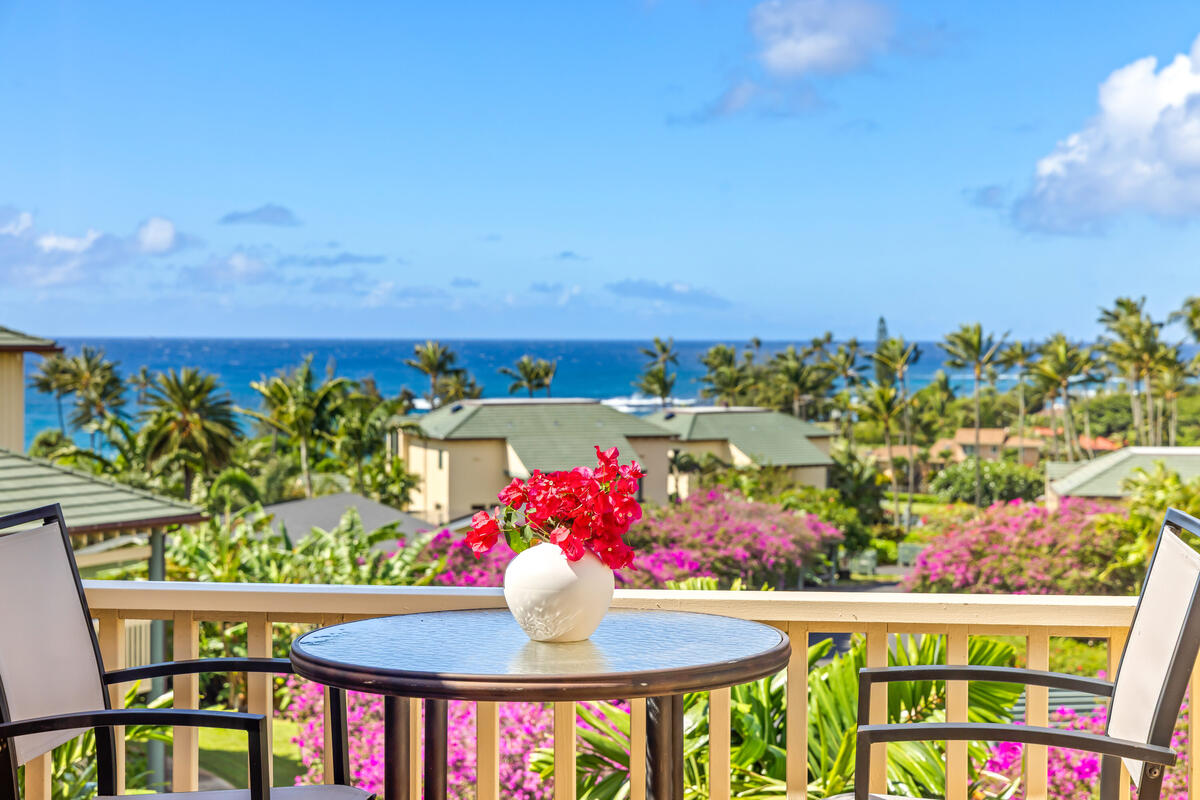 2371 Ho'ohu Road, Unit 703 Koloa, HI 96756 - Photo 1 of 27 a view of an outdoor dining space with furniture