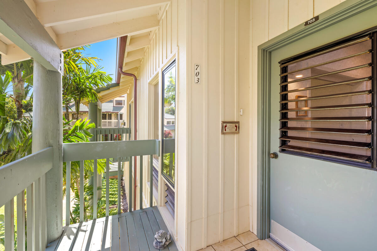 2371 Ho'ohu Road, Unit 703 Koloa, HI 96756 - Photo 3 of 27 a view of a balcony with wooden floor