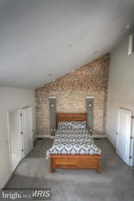 3616 Reisterstown Road Baltimore, MD 21215 - Photo 12 of 26 a living room with a rug