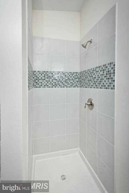 3616 Reisterstown Road Baltimore, MD 21215 - Photo 19 of 26 a bathroom with a shower