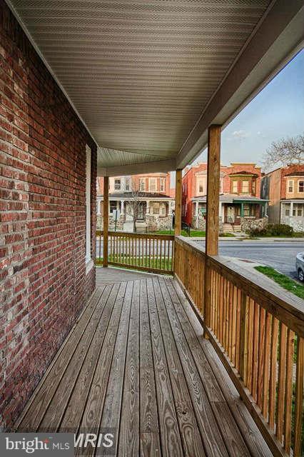 3616 Reisterstown Road Baltimore, MD 21215 - Photo 25 of 26 a view of a balcony with wooden floor