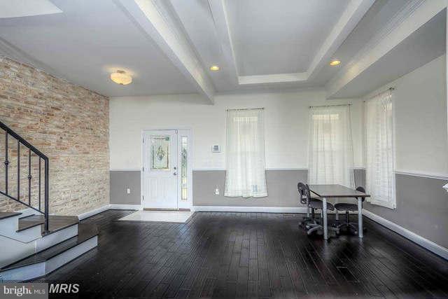 3616 Reisterstown Road Baltimore, MD 21215 - Photo 8 of 26 a view of a livingroom with furniture and wooden floor
