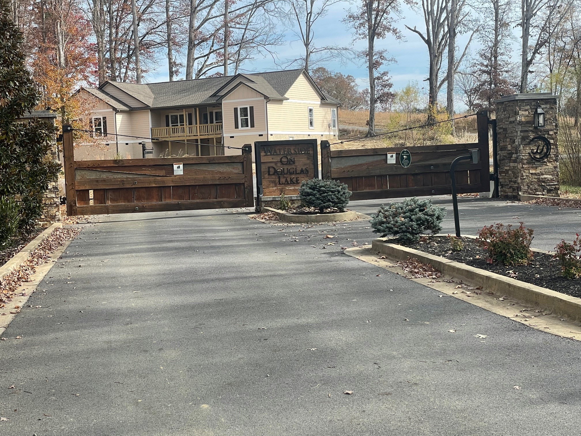 0 Quiet Cove Way Dandridge, TN 37725 - Photo 17 of 20 a view of a white house with a street