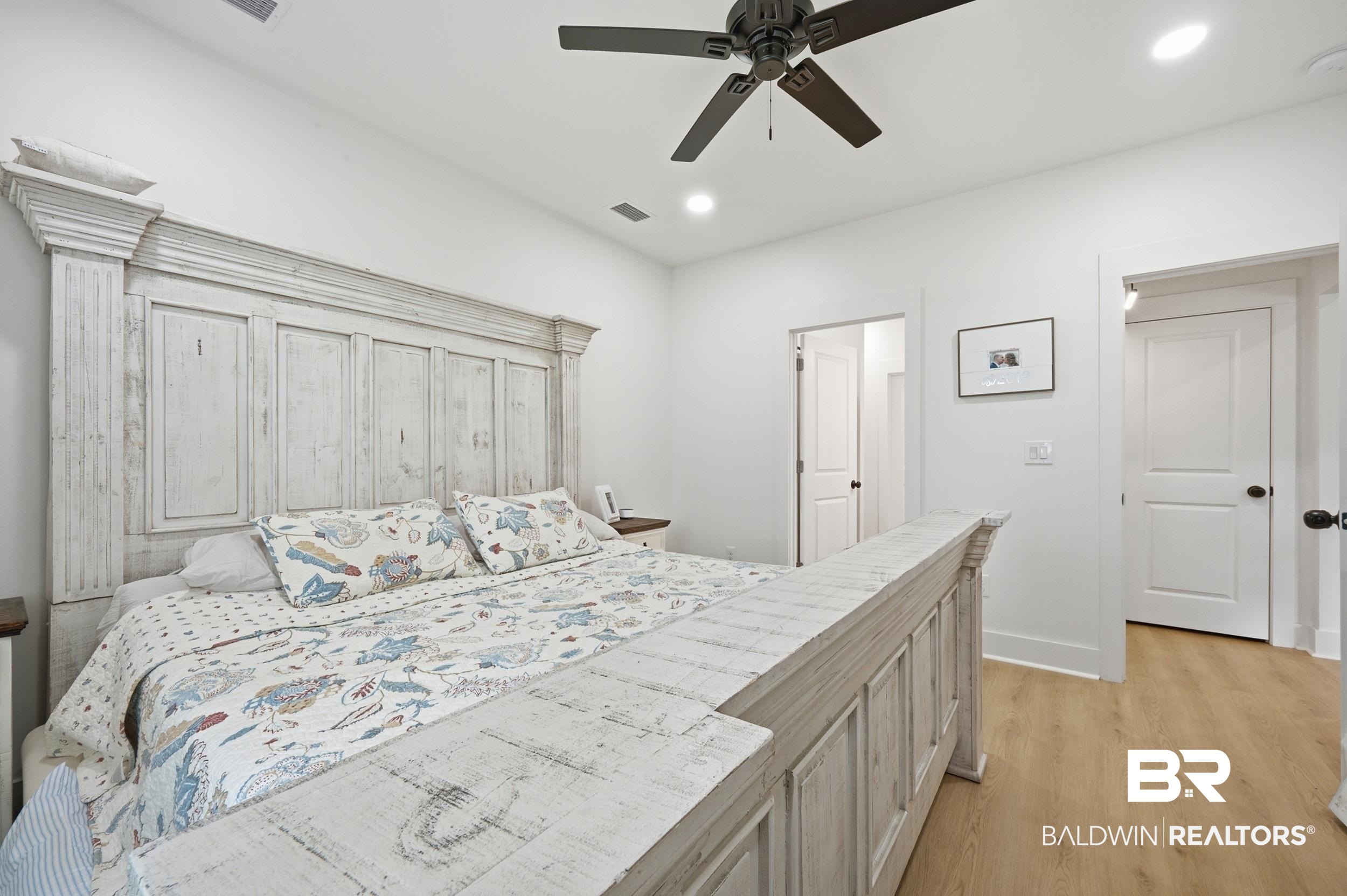 12019 Red Hill Rd Extension Bay Minette, AL 36507 - Photo 26 of 48 Recessed lighting illuminating a spacious room with light wood-finish flooring
