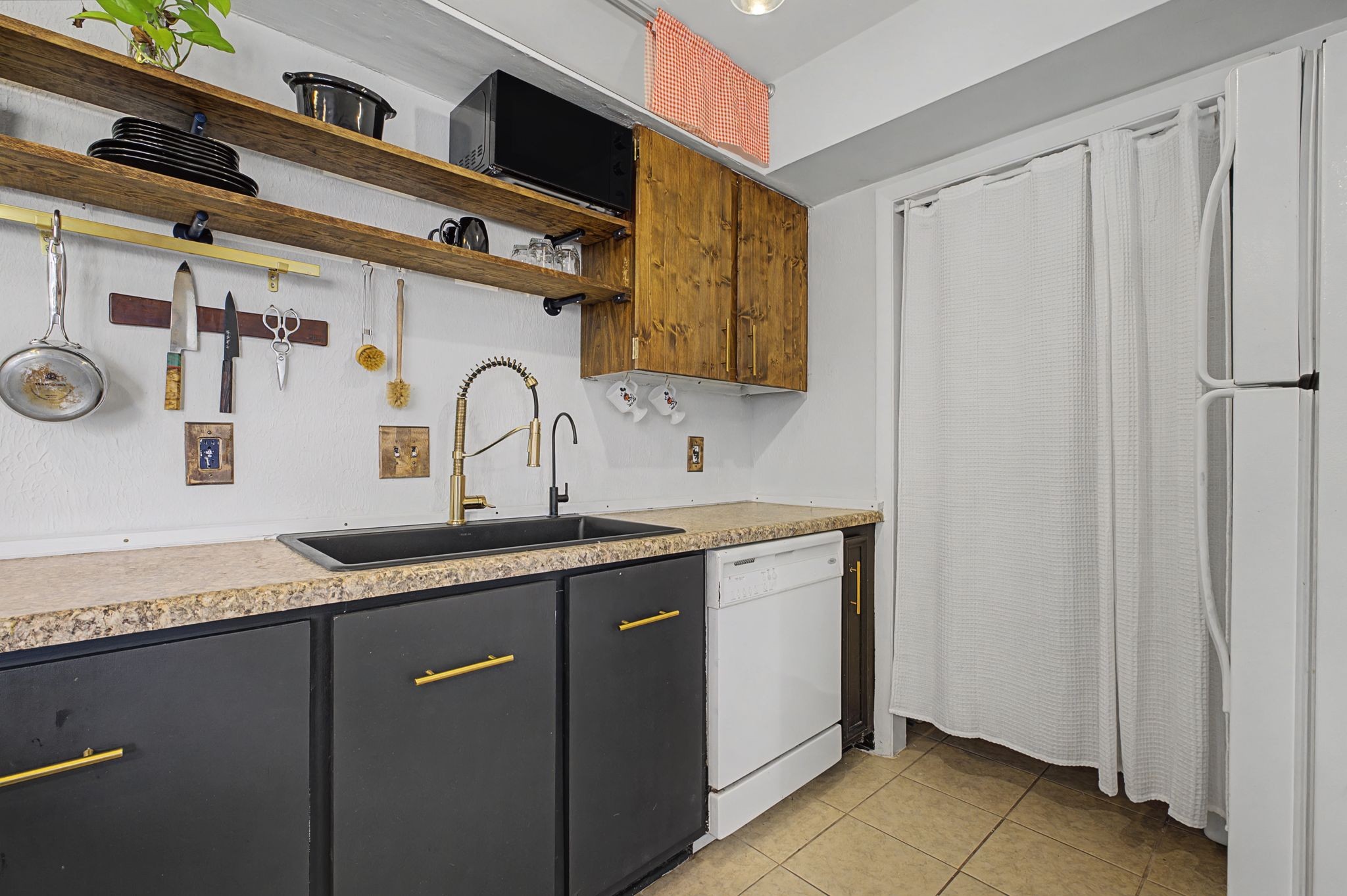 218 Harpers Mill Road Hermitage, TN 37076 - Photo 11 of 29 a kitchen with granite countertop a sink and cabinets