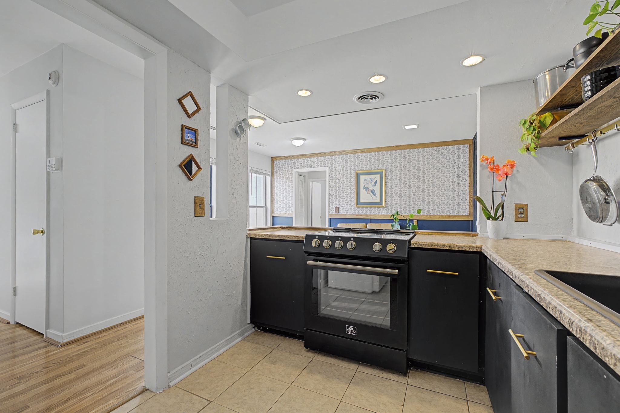 218 Harpers Mill Road Hermitage, TN 37076 - Photo 12 of 29 a kitchen with stainless steel appliances granite countertop a stove and a sink