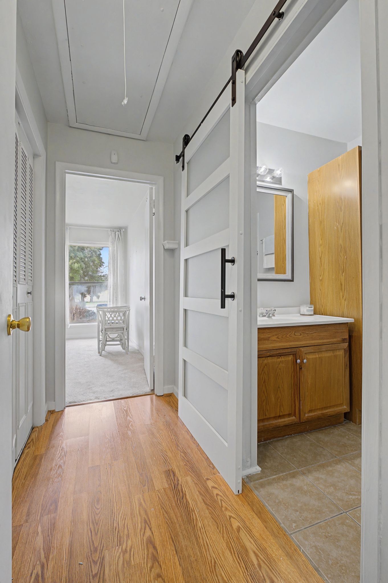 218 Harpers Mill Road Hermitage, TN 37076 - Photo 24 of 29 a view of a bathroom with a tub shower a sink and a mirror