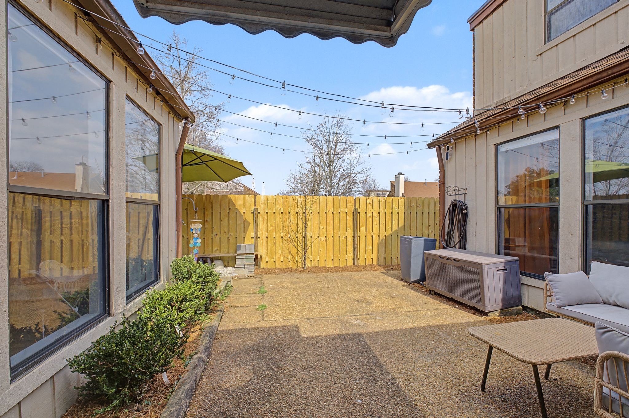 218 Harpers Mill Road Hermitage, TN 37076 - Photo 26 of 29 a view of a porch with furniture and floor to ceiling window