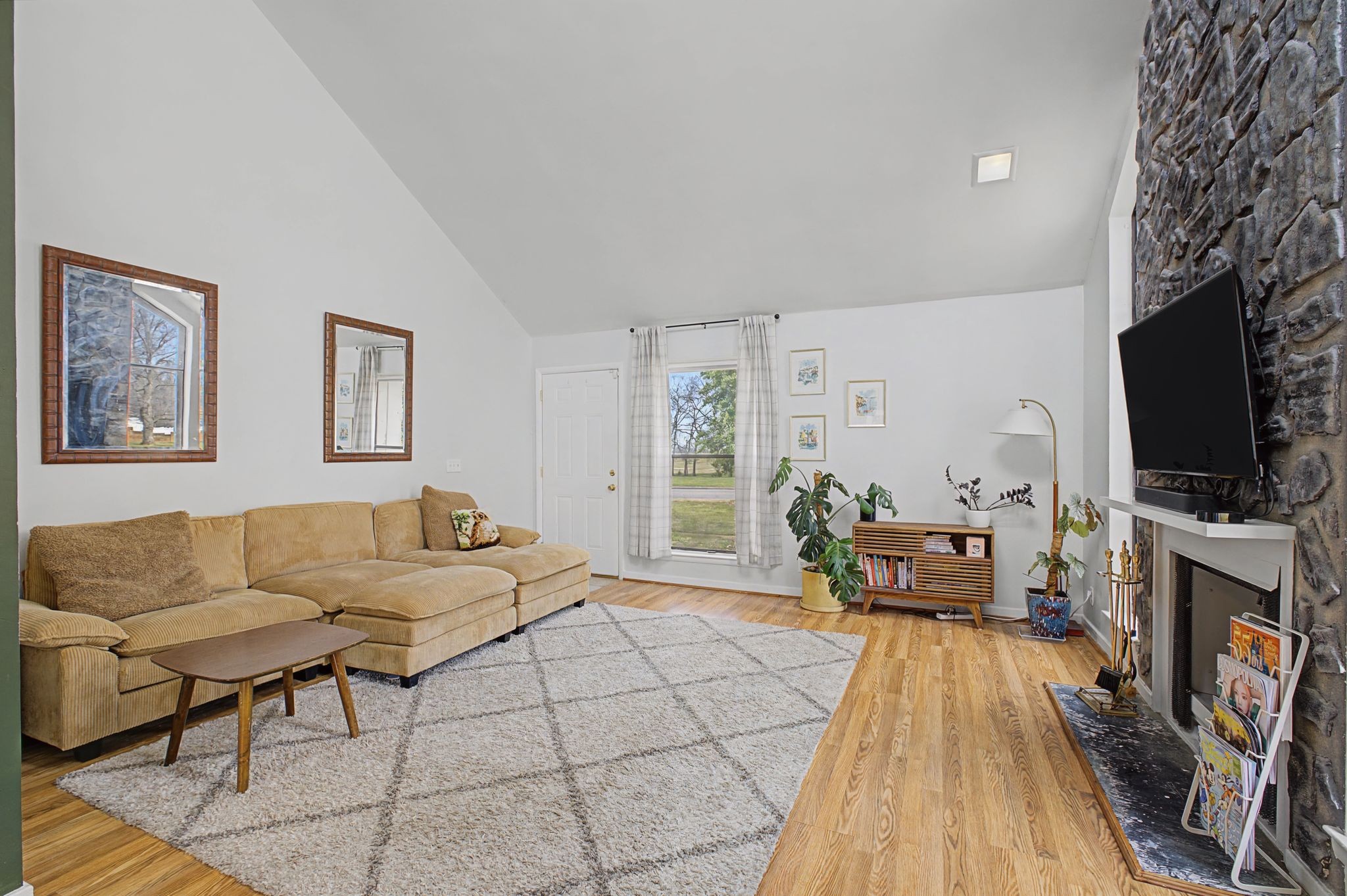 218 Harpers Mill Road Hermitage, TN 37076 - Photo 7 of 29 a living room with furniture and a flat screen tv