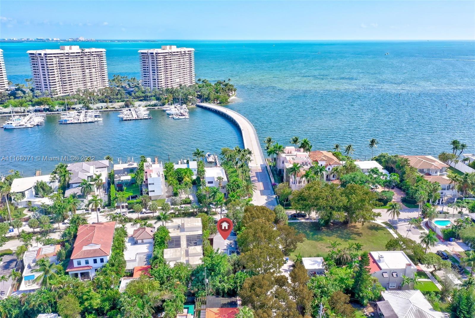 3571 Fair Isle Street Miami, FL 33133 - Photo 29 of 38 a view of a city with lots of flower and trees