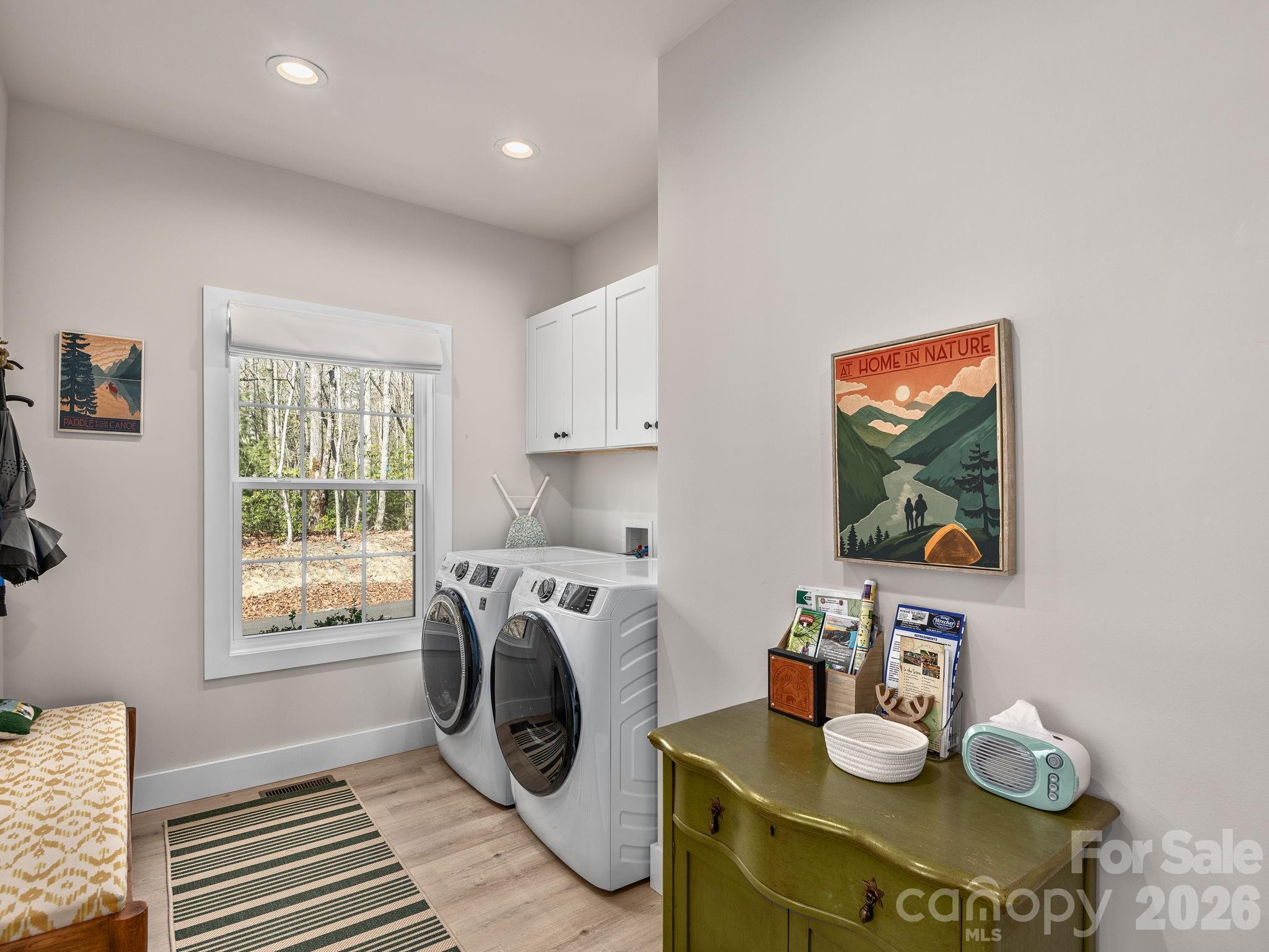 2201 Bulling Creek Road Hendersonville, NC 28739 - Photo 15 of 47 a view of kitchen and sink with wooden floor