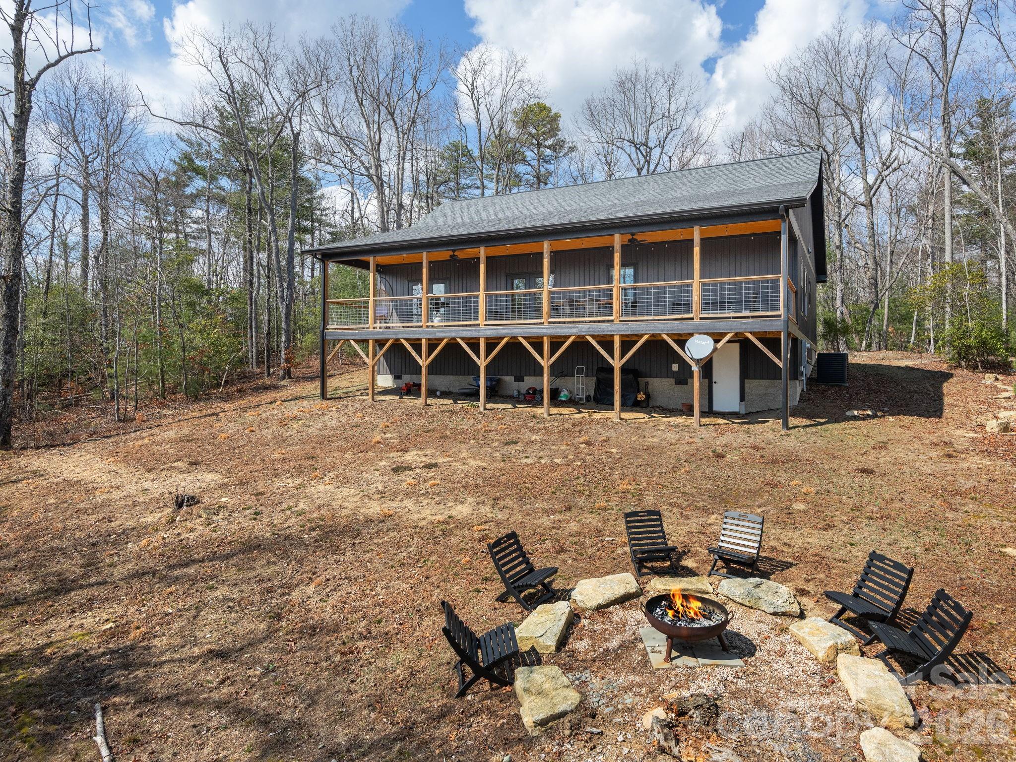 2201 Bulling Creek Road Hendersonville, NC 28739 - Photo 33 of 47 a front view of a house with garden