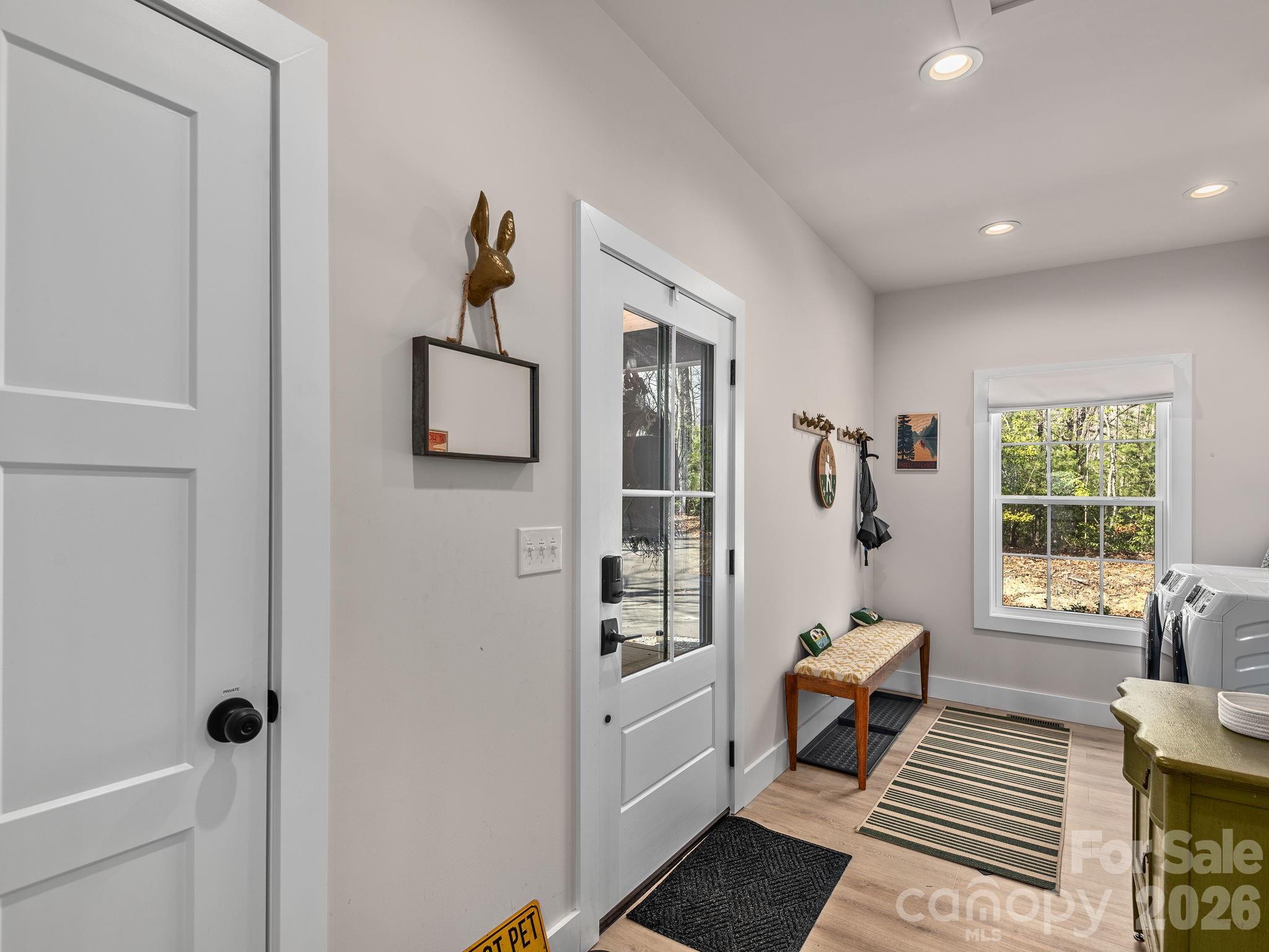 2201 Bulling Creek Road Hendersonville, NC 28739 - Photo 5 of 47 a living room with furniture and a window