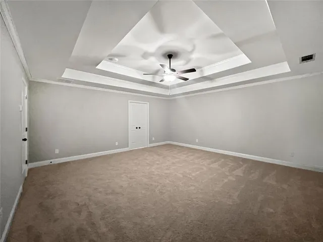 a spacious bathroom with a shower sink and mirror