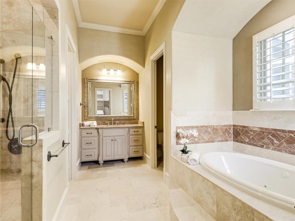 907 Foxglove Trail Fairview, TX 75069 - Photo 21 of 37 a spacious bathroom with a tub sink and mirror