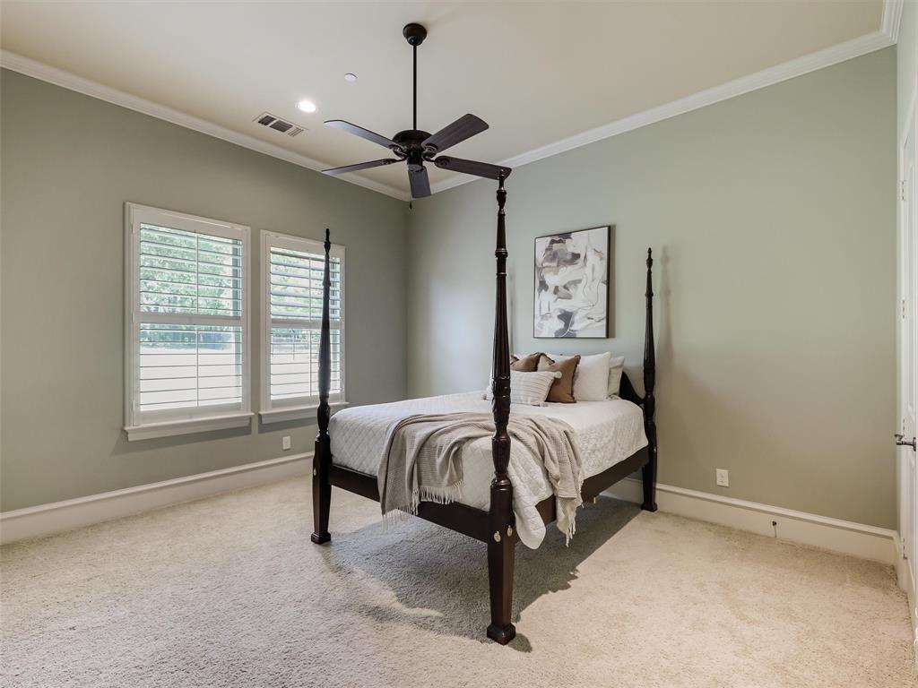 907 Foxglove Trail Fairview, TX 75069 - Photo 22 of 37 a bed room with a bed and a window