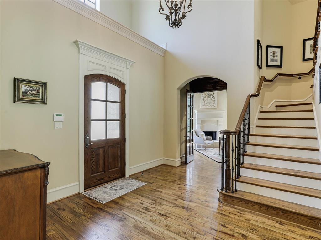 907 Foxglove Trail Fairview, TX 75069 - Photo 3 of 37 a view of entryway and hall with wooden floor