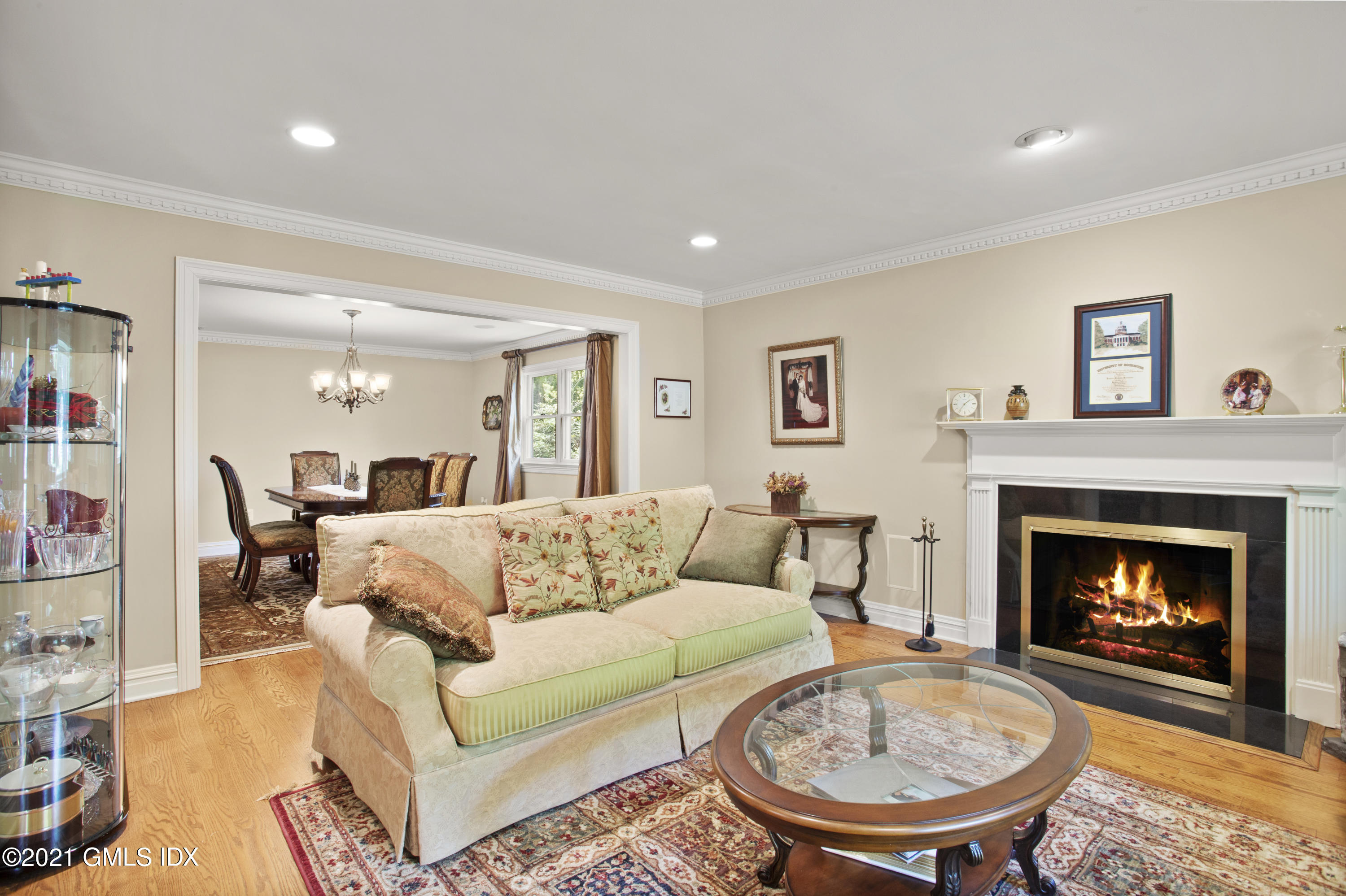 36 Long Meadow Road Riverside, CT 06878 - Photo 4 of 40 a living room with furniture and a fireplace
