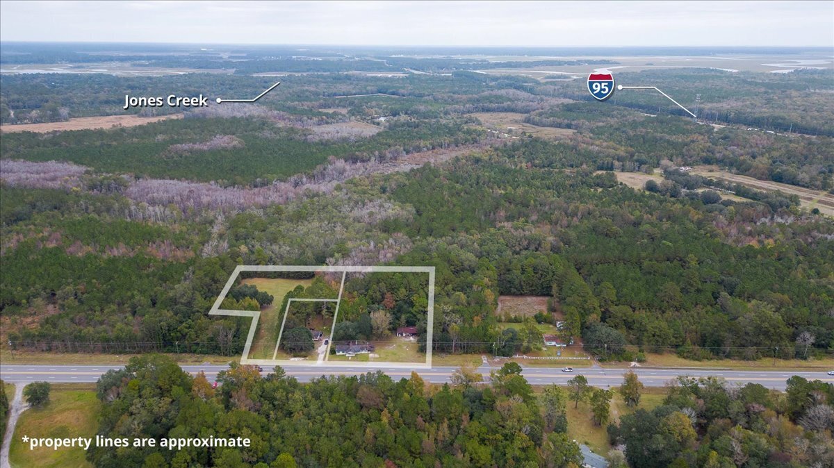 13220 East Oglethorpe Highway Midway, GA 31320 - Photo 10 of 11 an aerial view of a house with a yard