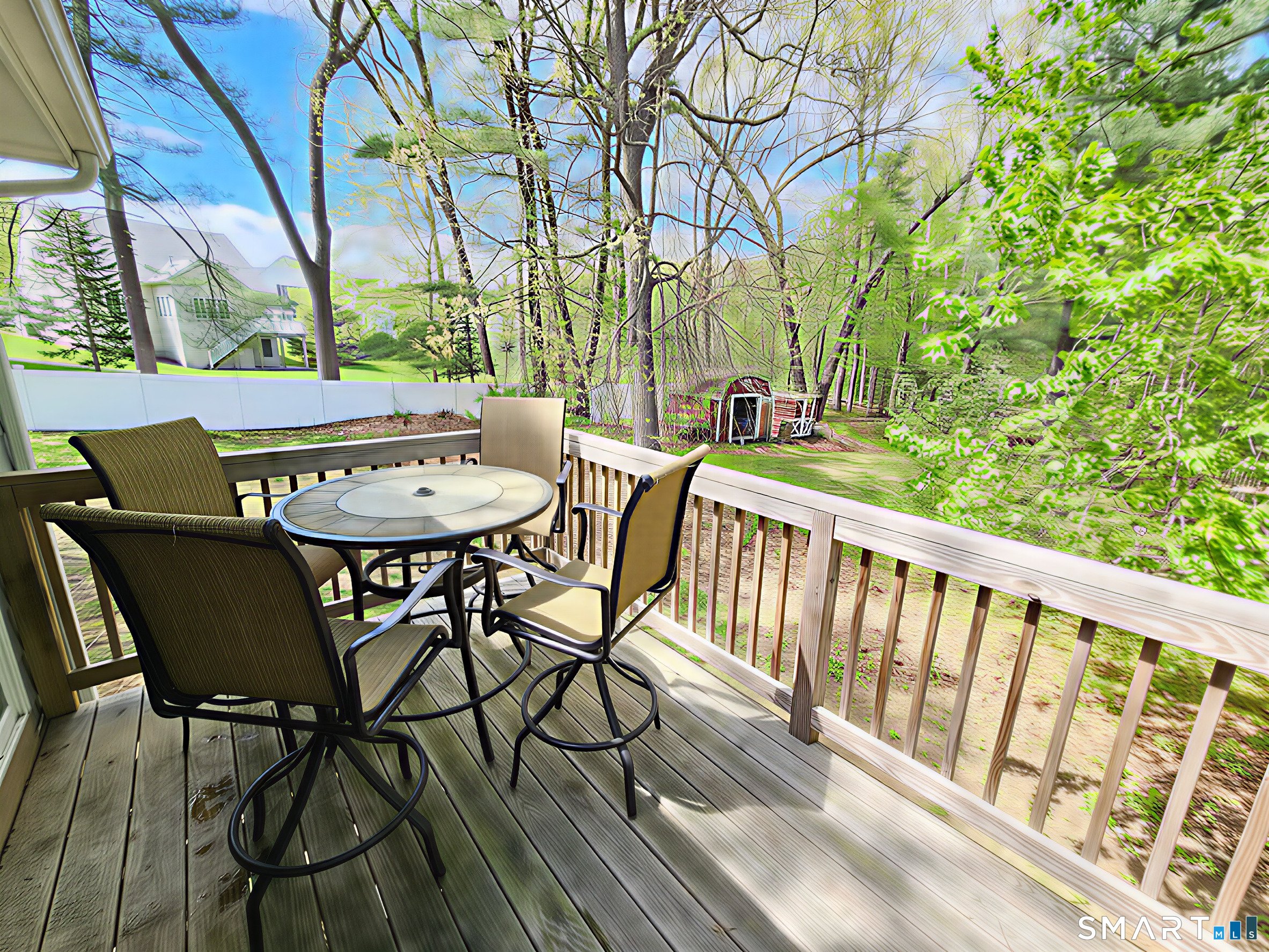 63 Pond Road Windsor, CT 06095 - Photo 16 of 17 a view of a chairs and table on the deck