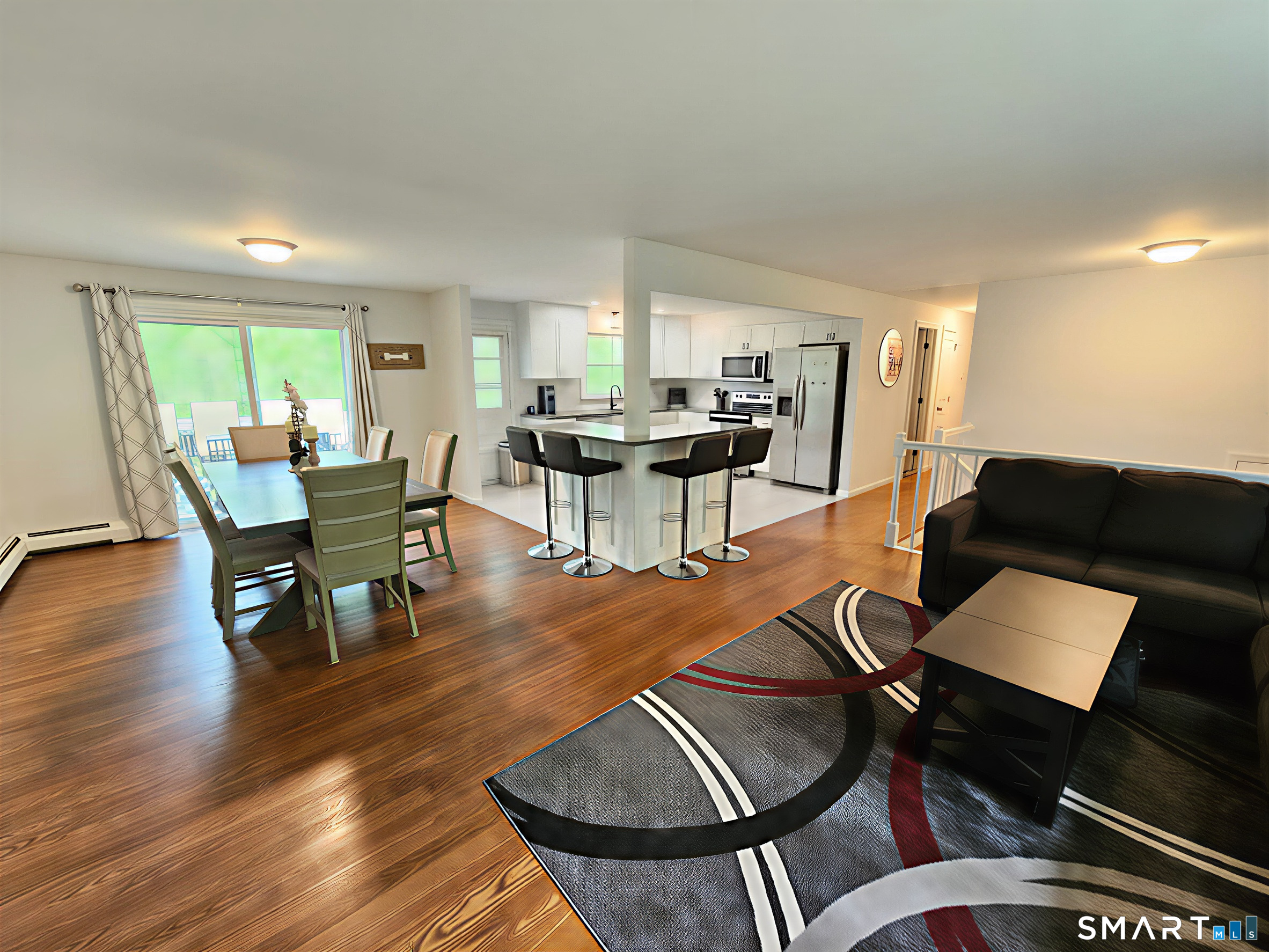 63 Pond Road Windsor, CT 06095 - Photo 4 of 17 a living room with furniture and wooden floor