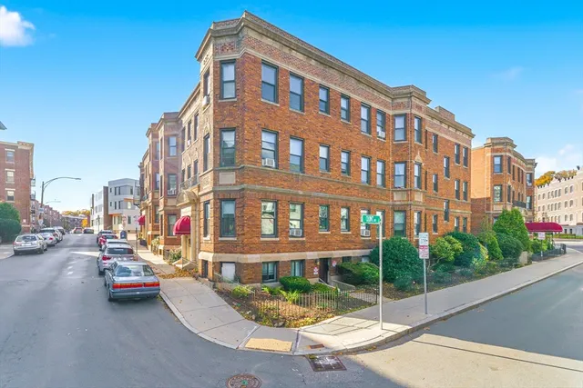 a city street lined with tall buildings